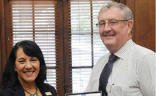 Mayor Ron Dyne congratulates Gympie Region Councillor Julie Walker for her 15 years of service to the community. Mayor Ron Dyne congratulates Gympie Region Councillor Julie Walker for her 15 years of service to the community.